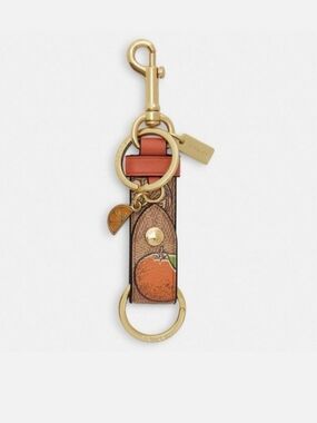 Trigger Snap Bag Charm In Signature Canvas With Orange Print